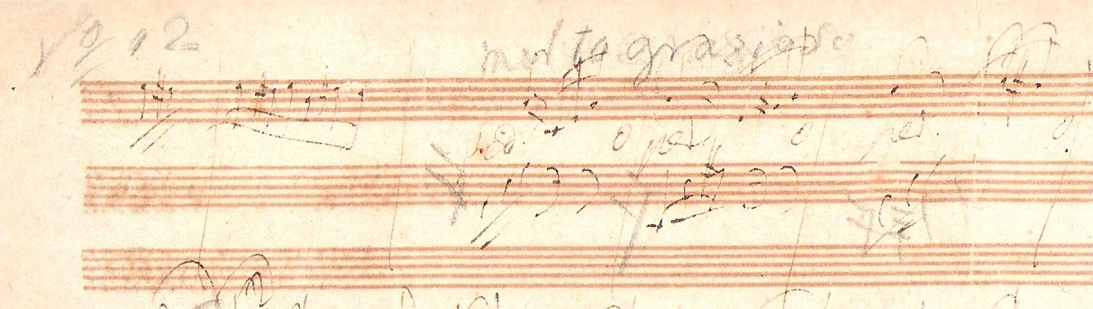 Two staves of music sketched in brown ink in Beethoven's hand, hurried, with corrections